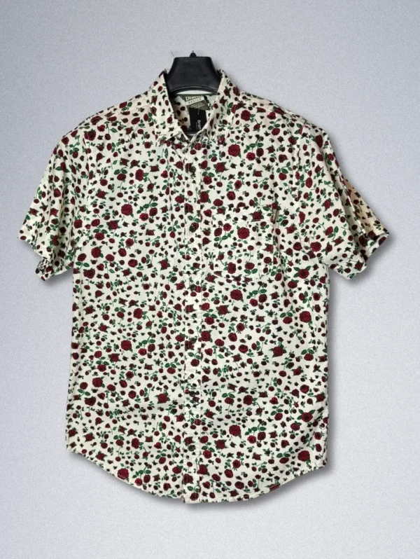 Men's Dravus Classic Rose Cotton Shirt, a short-sleeve button-down with an all-over print of small red roses on a cream background.