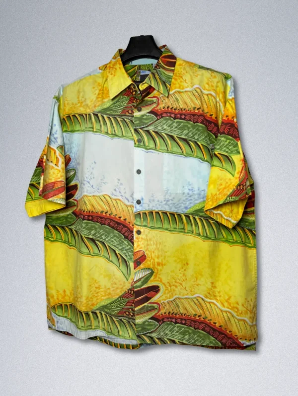 Men's CAMPTA Tropical Cotton Shirt, a short-sleeve button-down with a vibrant, abstract tropical leaf print.