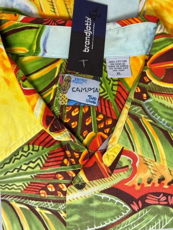 Men's CAMPTA Tropical Cotton Shirt, a short-sleeve button-down with a vibrant, abstract tropical leaf print.