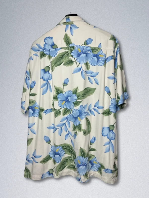 Men's Havana Jack's Cafe Hawaiian Shirt, a light-colored short-sleeve button-down with a blue hibiscus floral print.