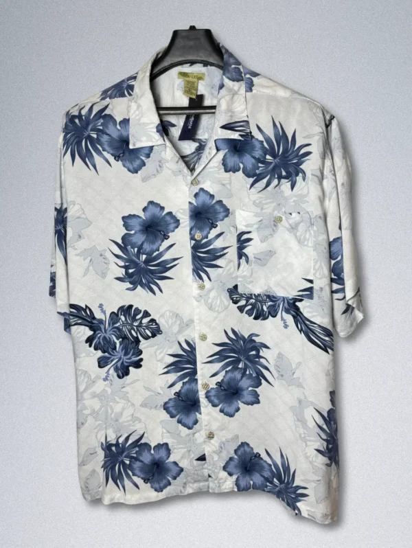 Men's ISLANDER Blue Floral Rayon Shirt, a white short-sleeve button-down with a blue and gray tropical floral print.