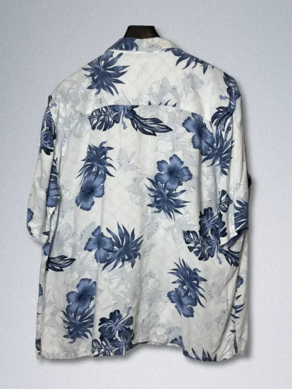 Men's ISLANDER Blue Floral Rayon Shirt, a white short-sleeve button-down with a blue and gray tropical floral print.
