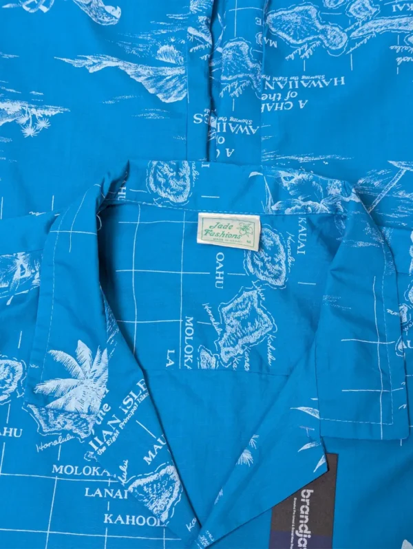 Men's Jade Fashion Tropical Cotton Shirt, a light blue button-down with a yellow hibiscus and tropical postcard print