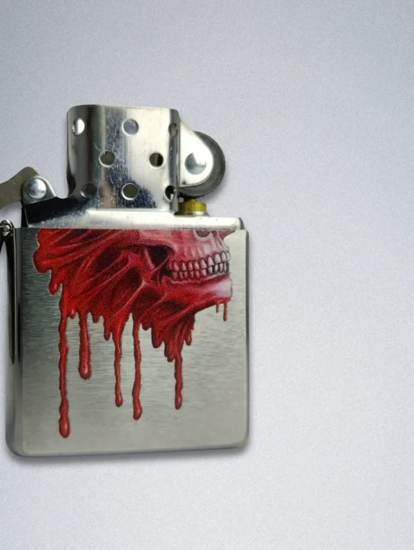Zippo 49603 Bloody Skull Lighter - Brushed Chrome Finish - Features a graphic red dripping skull design.